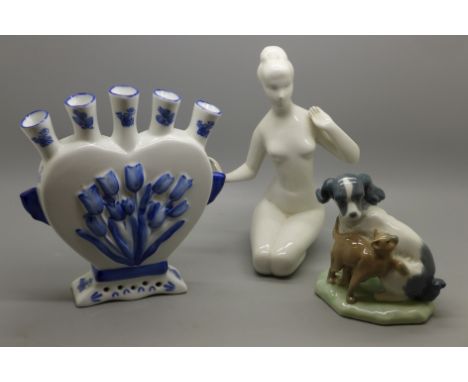 A Delft tulip vase, a Royal Dux figure and a Nao dog and cat figure 