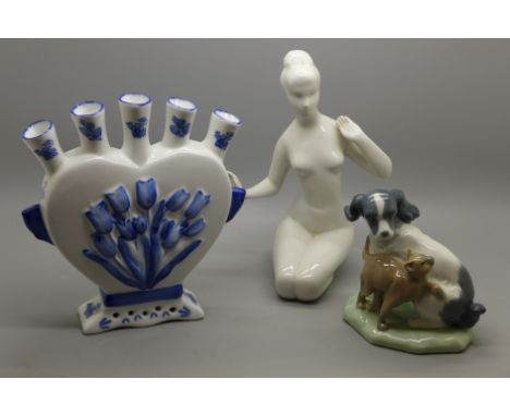 A Delft tulip vase, a Royal Dux figure and a Nao dog and cat figure 