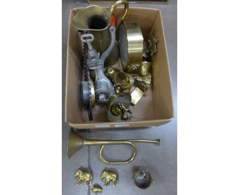 A box of mixed brass including a horn, barometer and a mincer **PLEASE NOTE THIS LOT IS NOT ELIGIBLE FOR POSTING AND PACKING*