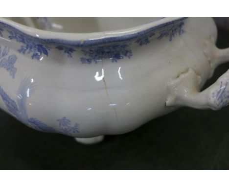 A large tureen with ladle, hairline crack to rim