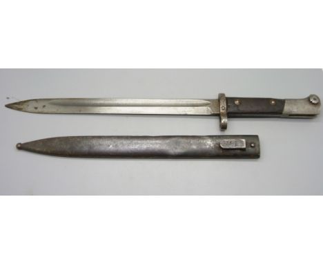 A WWII bayonet with scabbard, marked CSZ 