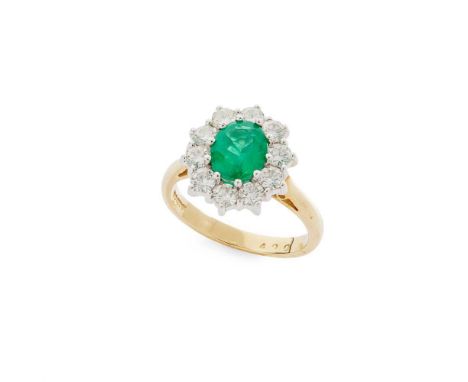 An emerald and diamond cluster ring Claw-set with an oval-cut emerald in a border of round brilliant-cut diamonds, modelled i