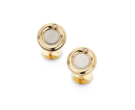 A pair of diamond cufflinks Each bi-coloured principal terminal collet-set with a round brilliant-cut diamond, secondary torp