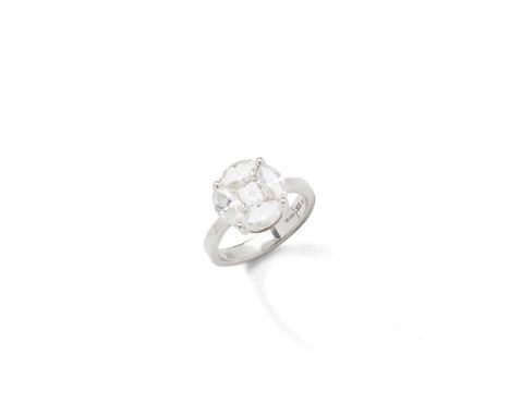 A diamond cluster ring The princess-cut diamond within a surround of four marquise-cut diamonds, to a polished bandDimensions