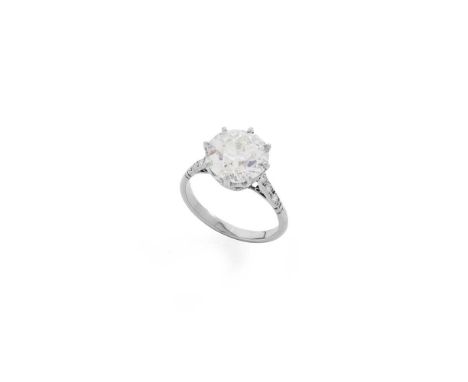 A diamond single-stone ring Claw-set with an old round-cut diamond, weighing approximately 3.88cts, each shoulder set with th