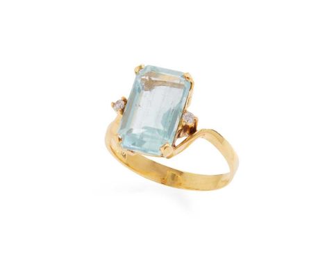 An aquamarine and diamond ring Claw-set with a cut-cornered rectangular step-cut aquamarine, each shoulder set with a round b