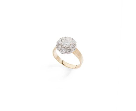 A diamond cluster ring Claw-set with a round brilliant-cut diamond in a surround of smaller round brilliant-cut diamonds, mod