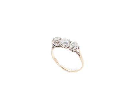 A diamond three-stone ring Claw-set with three graduated old round-cut diamonds, stamped 18ctDimensions:Ring size: K/L