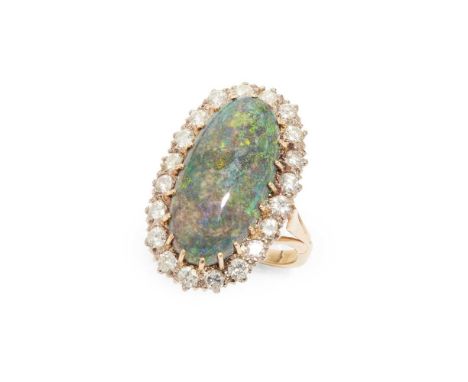 A boulder opal and diamond cluster ring Claw-set with a cabochon boulder opal in a border of round brilliant-cut diamonds, un