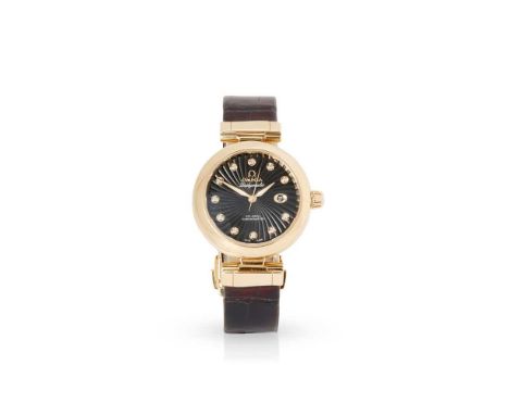 Y Omega de ville: An 18ct gold wristwatch Ladymatic de ville Coaxial, watch no 85632161, automatic, circular black spiral dia