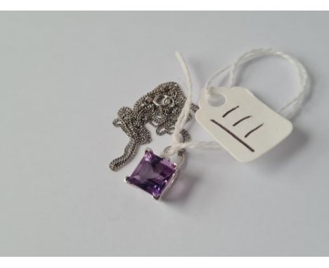 An amethyst square pendant in 18ct white gold on 9ct white gold chain