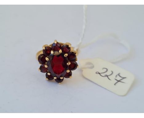 Large flower head garnet cluster ring in 9ct mount size K 3.9g inc