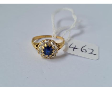 A GOOD SAPPHIRE &amp; DIAMOND CLUSTER RING IN 18CT GOLD - size K.5 - 2.3gms