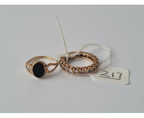 An C.Z eternity ring &amp; an onyx panel ring in 9ct - size both M - 4.5gms