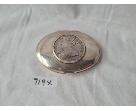 A eighteenth century oval snuff box with gilded interior the top inset with a crown 1713 3 inches wide 