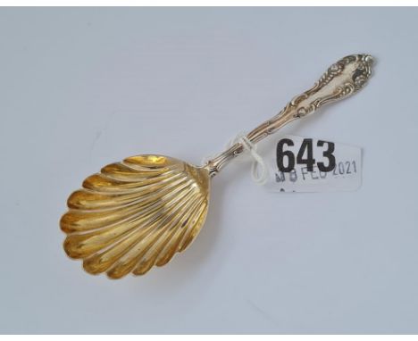 A decorative late Victorian caddy spoon with scroll edge, Birmingham 1898 by JR ltd