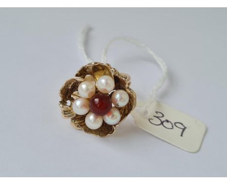 A pearl and cornelian flower head ring in 9ct mount size L 6.9g inc