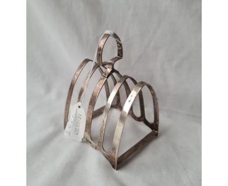 A arched five bar toast rack bracket feet Sheffield 84 gms 