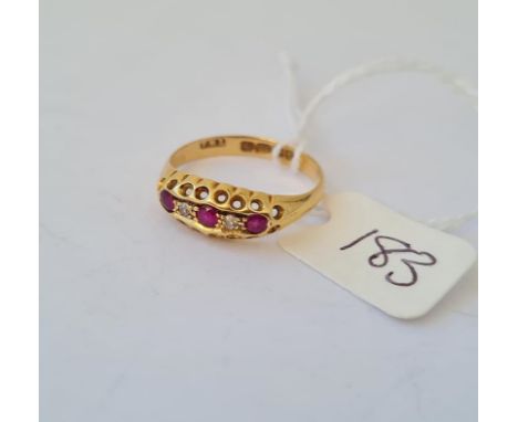 A five stone ruby and diamond 18ct gold ring size Q 2.7g inc
