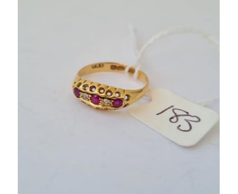 A five stone ruby and diamond 18ct gold ring size Q 2.7g inc