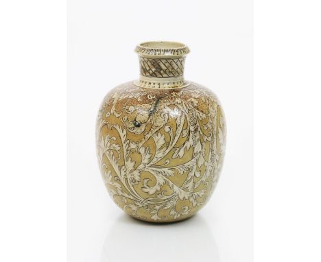 A Martin Brothers stoneware vase by Robert Wallace Martin, incised with mythical dragon creatures issuing from scrolling foli