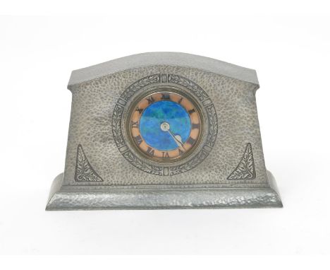 A Liberty & Co Tudric Pewter and enamel mantel clock, model no.01156, hammered finish, cast in low relief with foliate panels