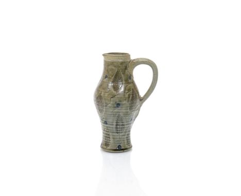 A Martin Brothers stoneware jug by Robert Wallace Martin, swollen cylindrical form, incised with simple leaf design, glazed i