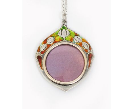 A W.H. Haseler silver and enamel pendant designed by Archibald Knox,  shield shape, cast in low relief with flower stems, ena