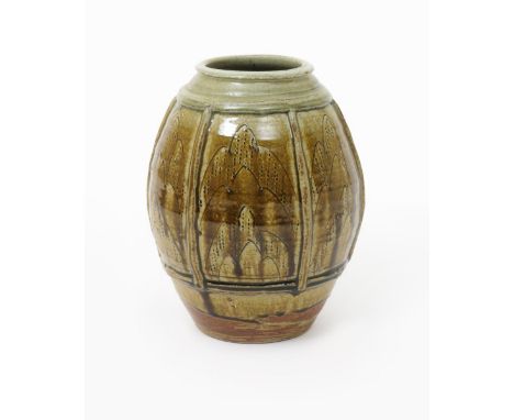 Mike Dodd (born 1943) a shouldered ovoid vase with modelled ribs, incised with grass motif panels, covered to the base with a