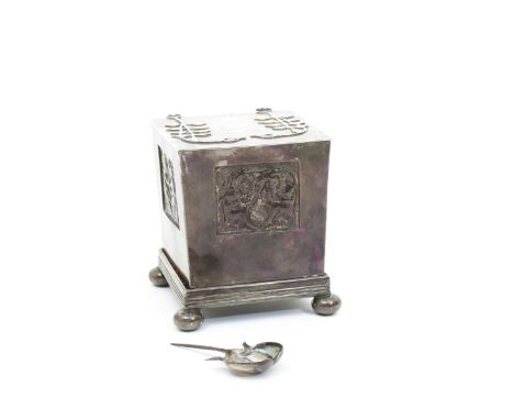 A silver tea caddy and cover with en suite caddy spoon designed by James Herbert Macnair, square section, cast with panels of