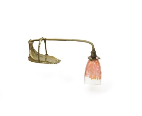 An Amsterdam School brass piano lamp, with Palme Koenig mottled pink glass shade unsigned 40cm. wide
