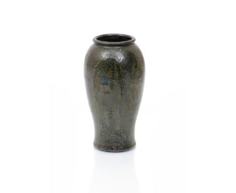 A Martin Brothers stoneware vase by Robert Wallace Martin, incised with foliate design, glazed in shades of green, incised R 