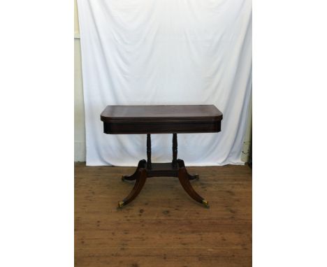 A mid 19th century mahogany and ebony inlaid card table, the D-shape top opening to reveal a green baize lined interior on qu