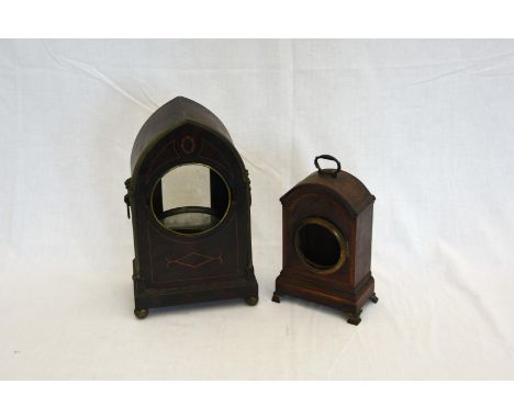 A small walnut and marquetry inlaid clock case and a mahogany and boxwood strung Gothic style ditto.  Est £10-20