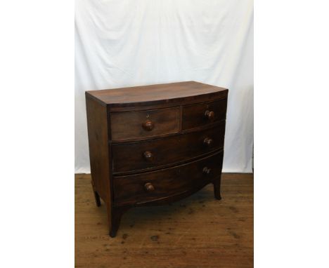 A Victorian mahogany bow front chest of two short and two long drawers, on out-splayed bracket feet.  34¾ins wide.  Est £30-5