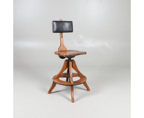 AN EARLY 20TH CENTURY ARTIST'S SWIVEL CHAIR. probably elm and beech construction with adjustable studded leather back rest on