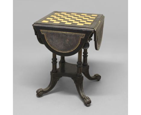 A VICTORIAN GILLOW'S EBONISED GAMES TABLE. the top with tooled leather insert reversing to a chess board and four leather-top