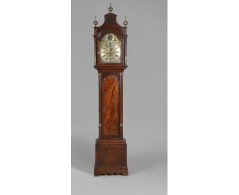 AN 18TH CENTURY MAHOGANY LONGCASE CLOCK. the 11 1/2" brass dial with silvered chapter ring, strike/silent dial and date apert