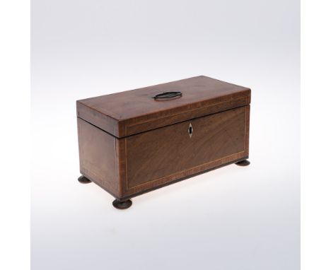 A REGENCY MAHOGANY TEA CADDY. with boxwood and crossbanded inlay, the interior with twin lidded canisters and glass mixing bo