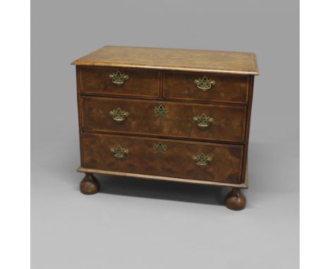 A WILLIAM AND MARY OYSTER VENEERED CHEST OF DRAWERS. the moulded rectangular top with concentric circle inlay above two short