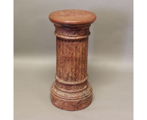A FAUX ROGUE MARBLE PEDESTAL COLUMN. of hollow plaster construction, stamped L. Bruciotti, 99 Leather Lane, height 77cm. * Ge