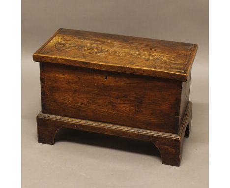 A GEORGE II ELM MARRIAGE CHEST. of rectangular form, with iron locking plate and bracket feet, height 41cm, width 60cm, depth