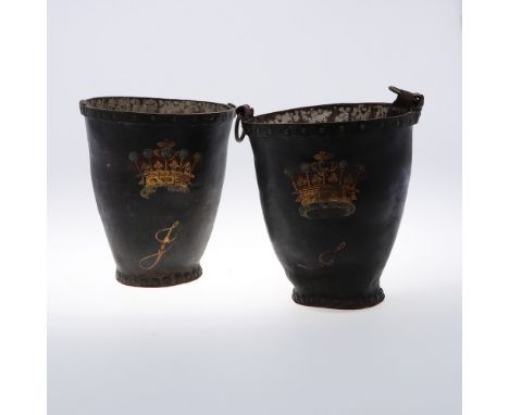 A PAIR OF EARLY 19TH CENTURY LEATHER FIRE BUCKETS. with studded banding and painted coronets, height 30cm. * Lacking strap ha
