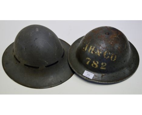 2 OLD ARMY HELMETS     