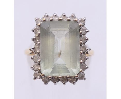An 18 ct gold diamond set ring. Ring size Q. 