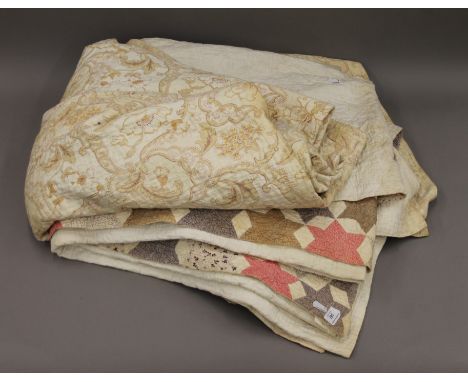Two vintage patchwork quilts. approximately 190 x 225 cms and 190 x 230 cms.