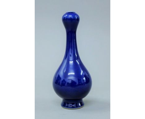 A Chinese blue garlic neck vase.  17 cm high. 