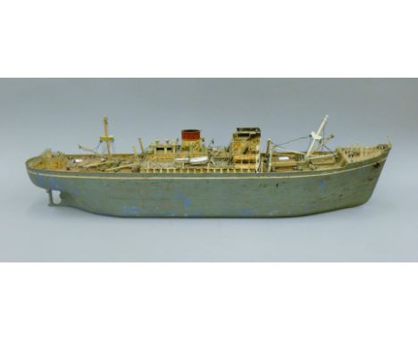 A vintage metal Scratch Built model ship named The Penang. 93 cm long.
