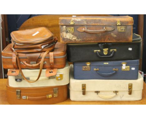 A quantity of vintage suitcases, shoe lasts, a pair of ice skates and a pair of leather boots. The largest case 60 cm wide.