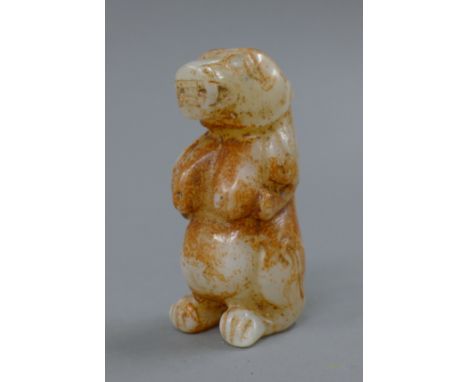 A russet jade dog-of-fo. 8.5 cm high. 